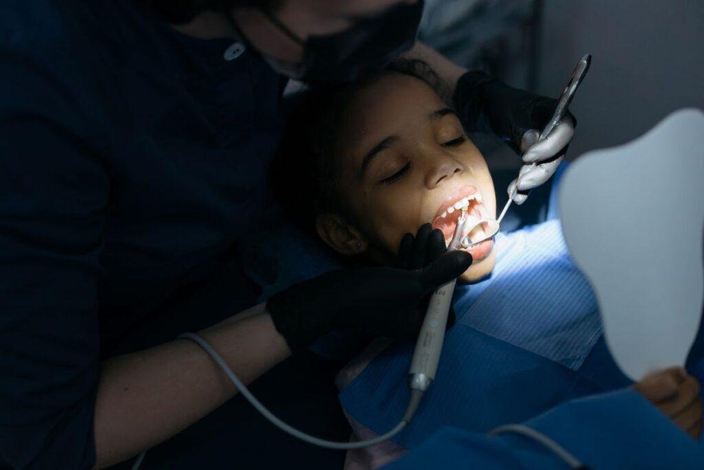Happy toddler enjoying a friendly dental visit
